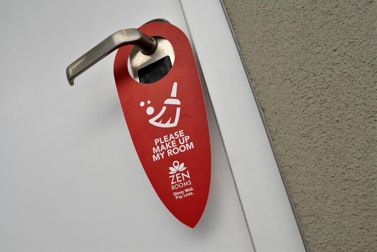 Zen Rooms Kuta Tuban Suites Экстерьер фото